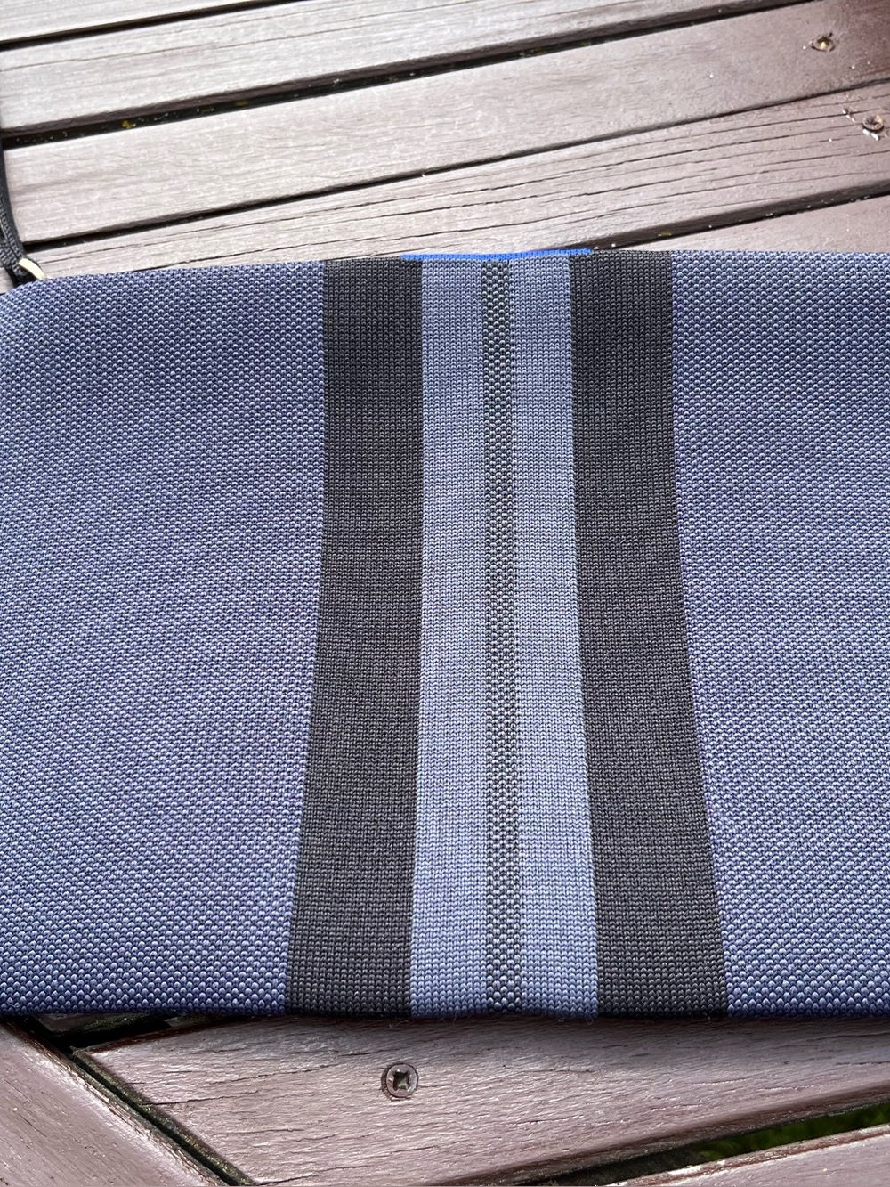 Rothy’s Essential Clutch in Navy/Midnight Colorblock
